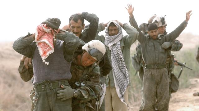 Marines round up captured Iraqi soldiers